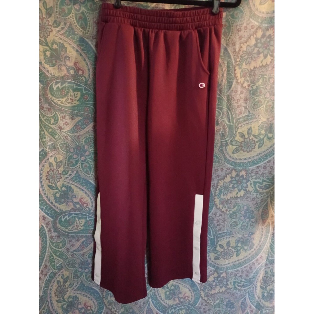 wine red Champion scuba track pants featuring contrasting white side stripes